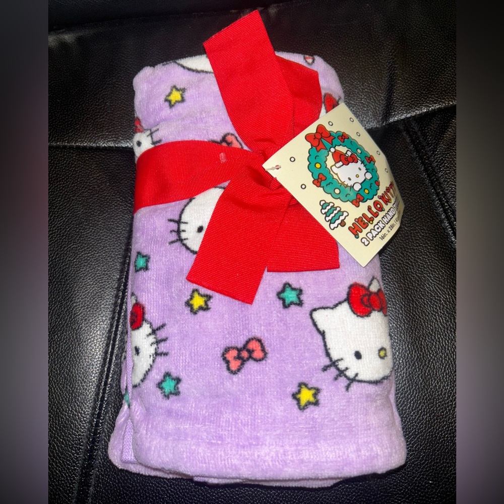 Hello Kitty Lavender Purple Star & Bow Pattern Hand Towel with Red Bow Accent